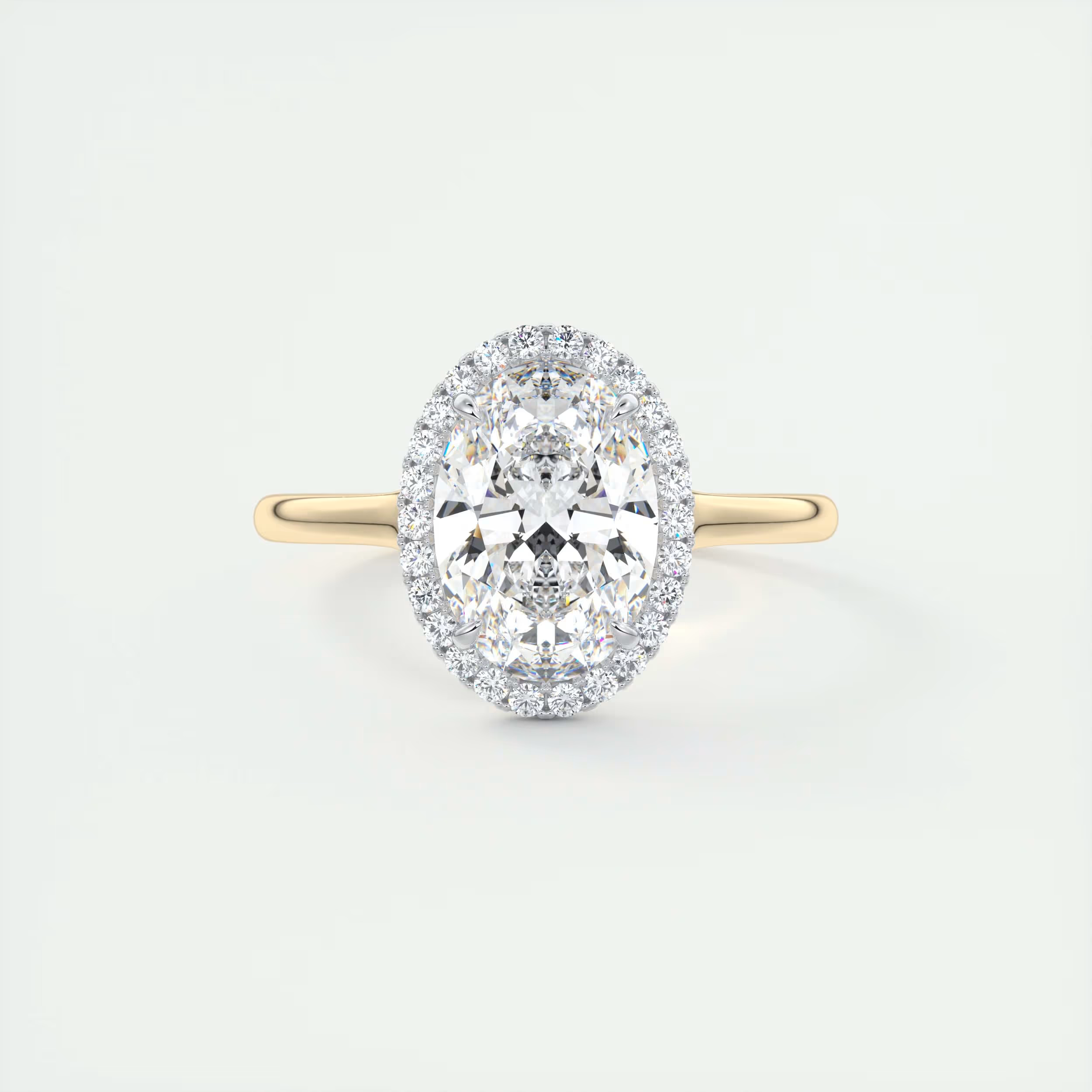 Slim 2 Carat Oval Center with French Set Halo
