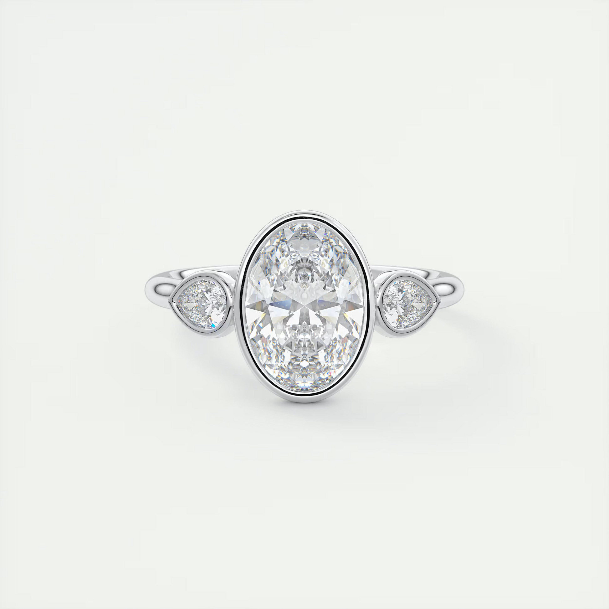 Bold 2 Carat Oval & Pear Three-Stone Bezel Set Engagement Ring