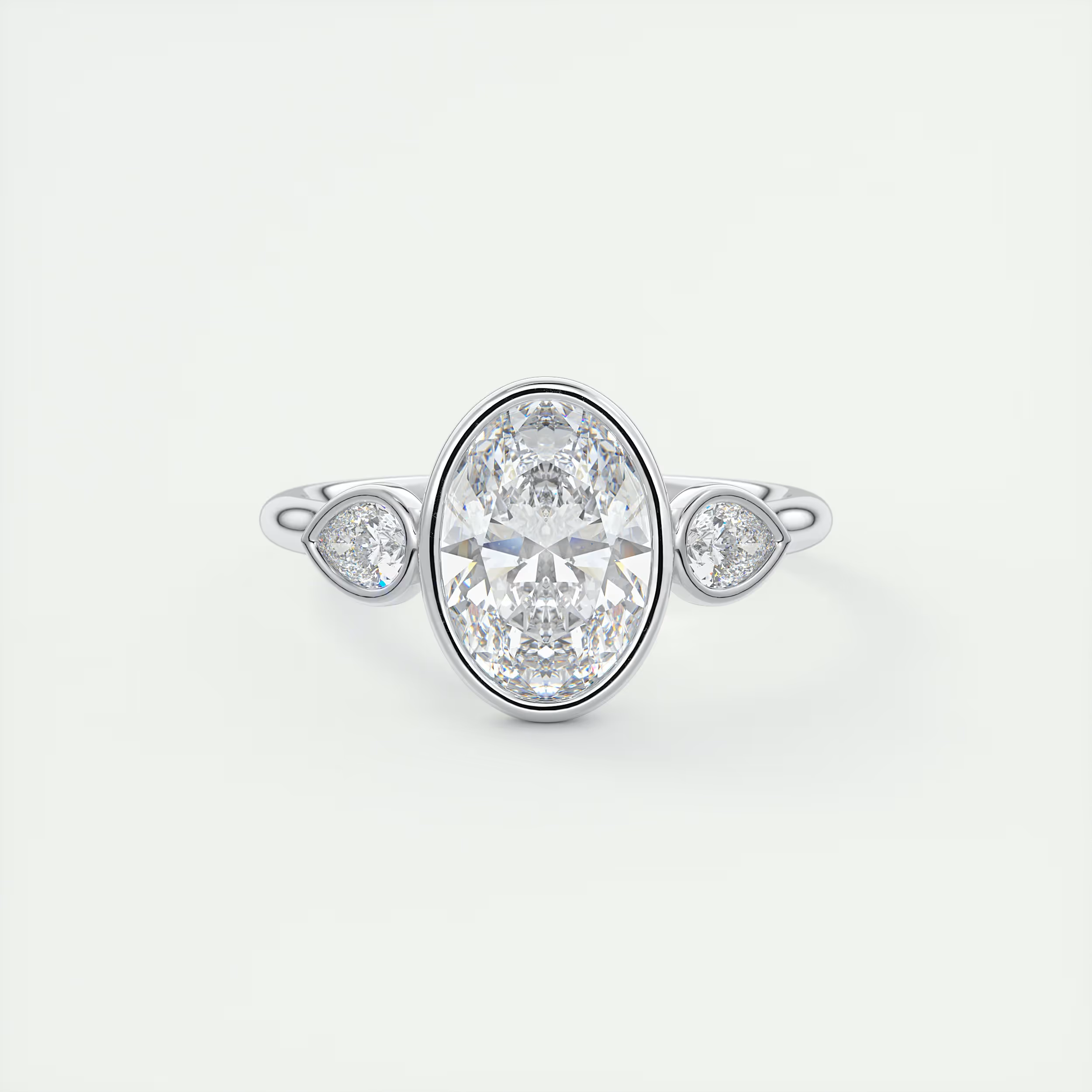 Bold 2 Carat Oval & Pear Three-Stone Bezel Set Engagement Ring
