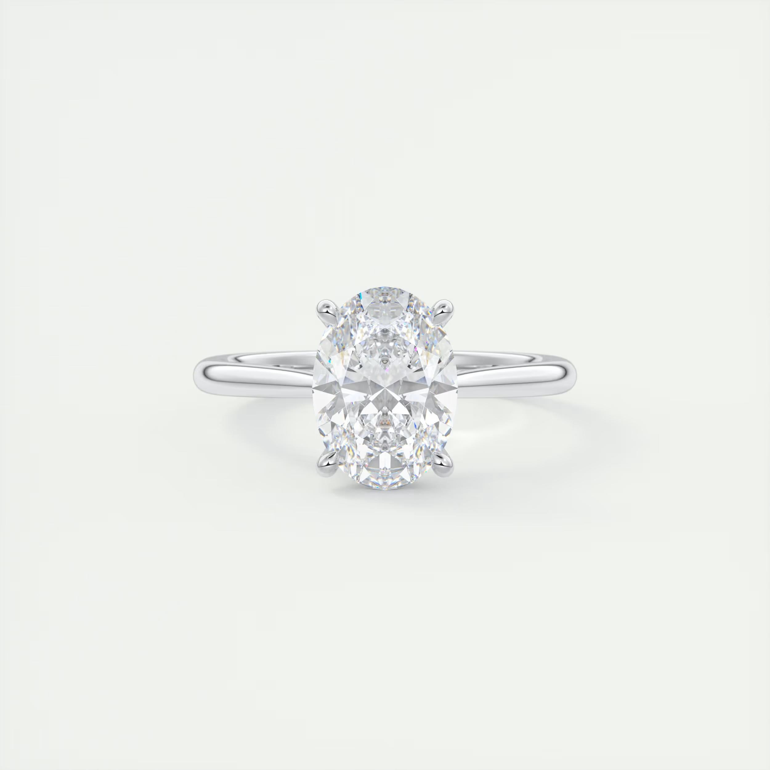 2 Carat Oval Gold Cathedral Solitaire with Platinum Prongs
