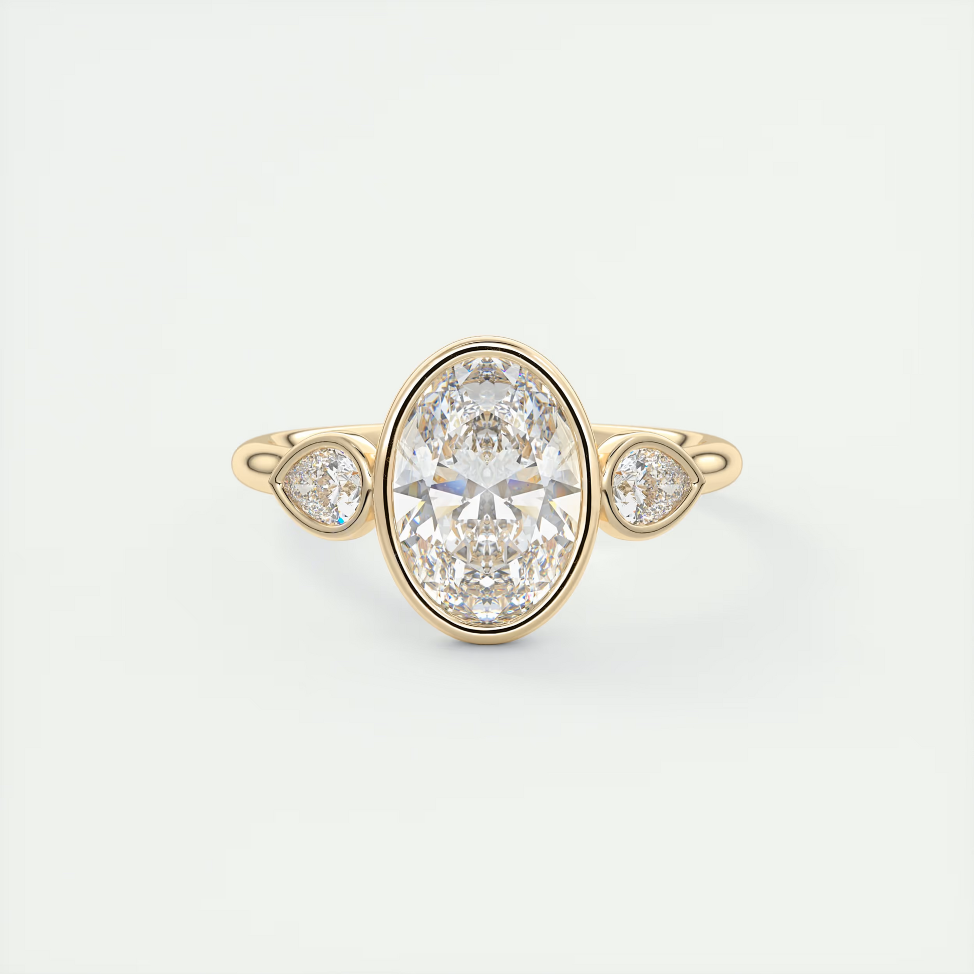Bold 2 Carat Oval & Pear Three-Stone Bezel Set Engagement Ring