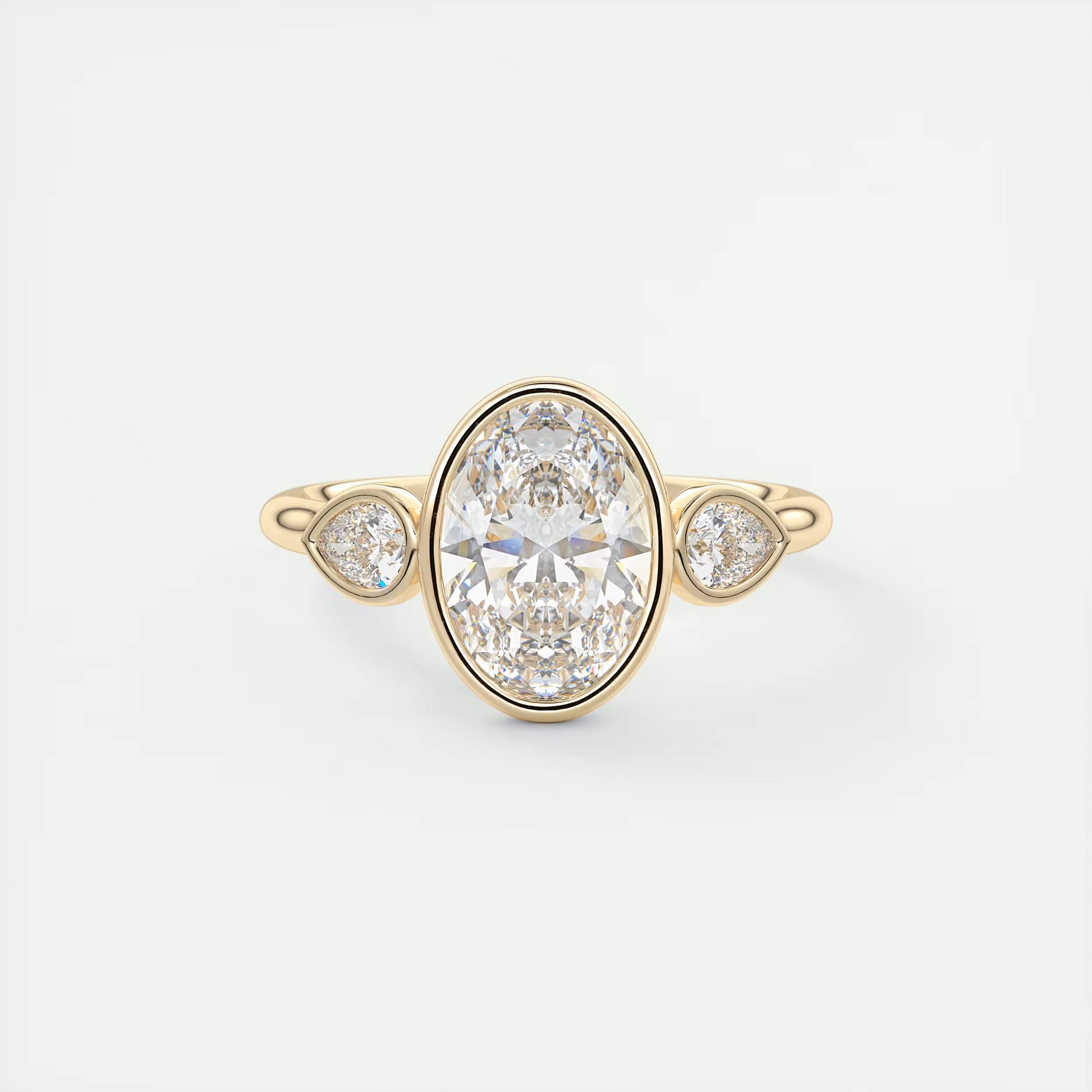 Bold 2 Carat Oval & Pear Three-Stone Bezel Set Engagement Ring