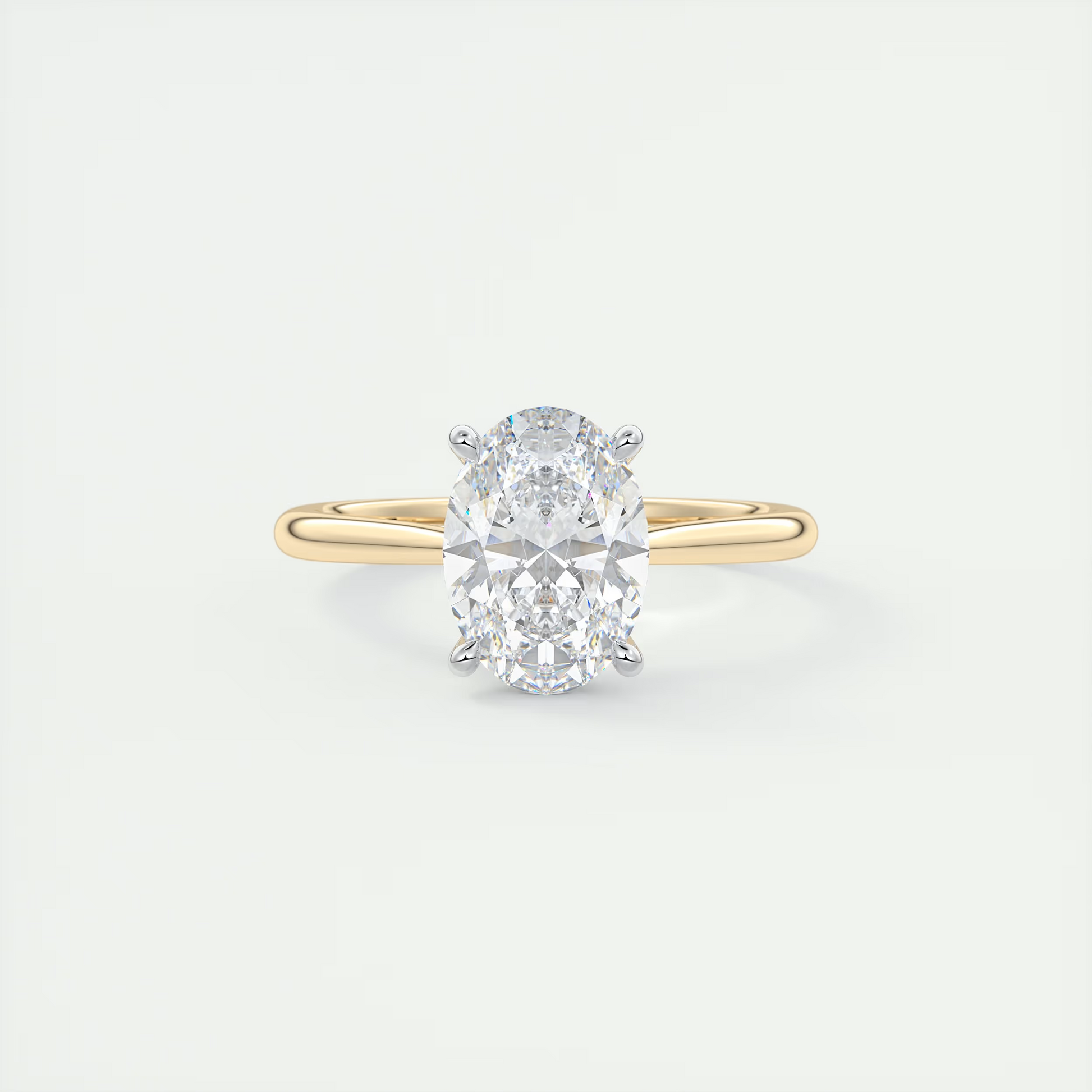 2 Carat Oval Gold Cathedral Solitaire with Platinum Prongs