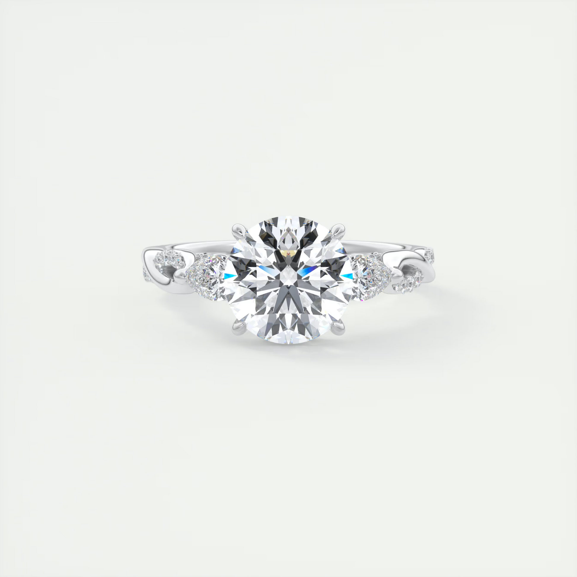 Infinity Twist 2 Carat Round Solitaire with 0.25tcw Pavé Band