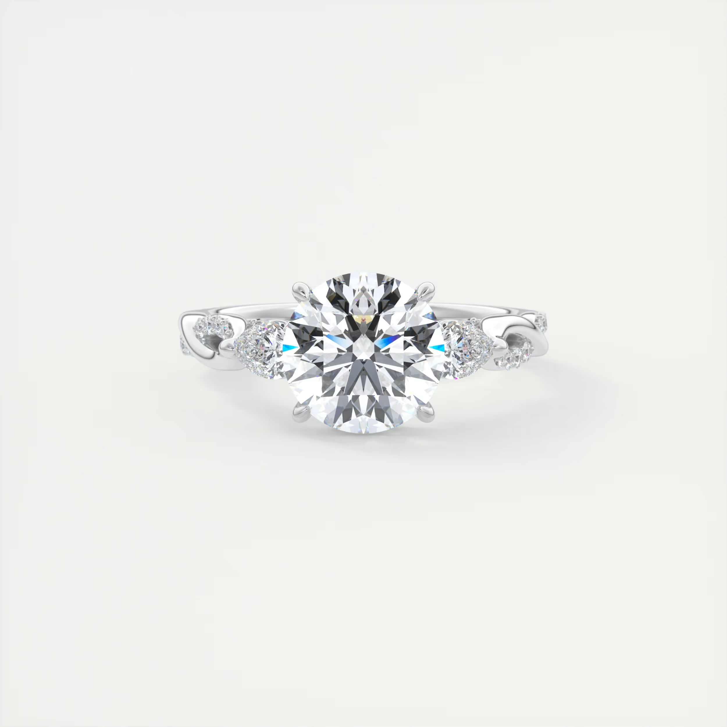Infinity Twist 2 Carat Round Solitaire with 0.25tcw Pavé Band