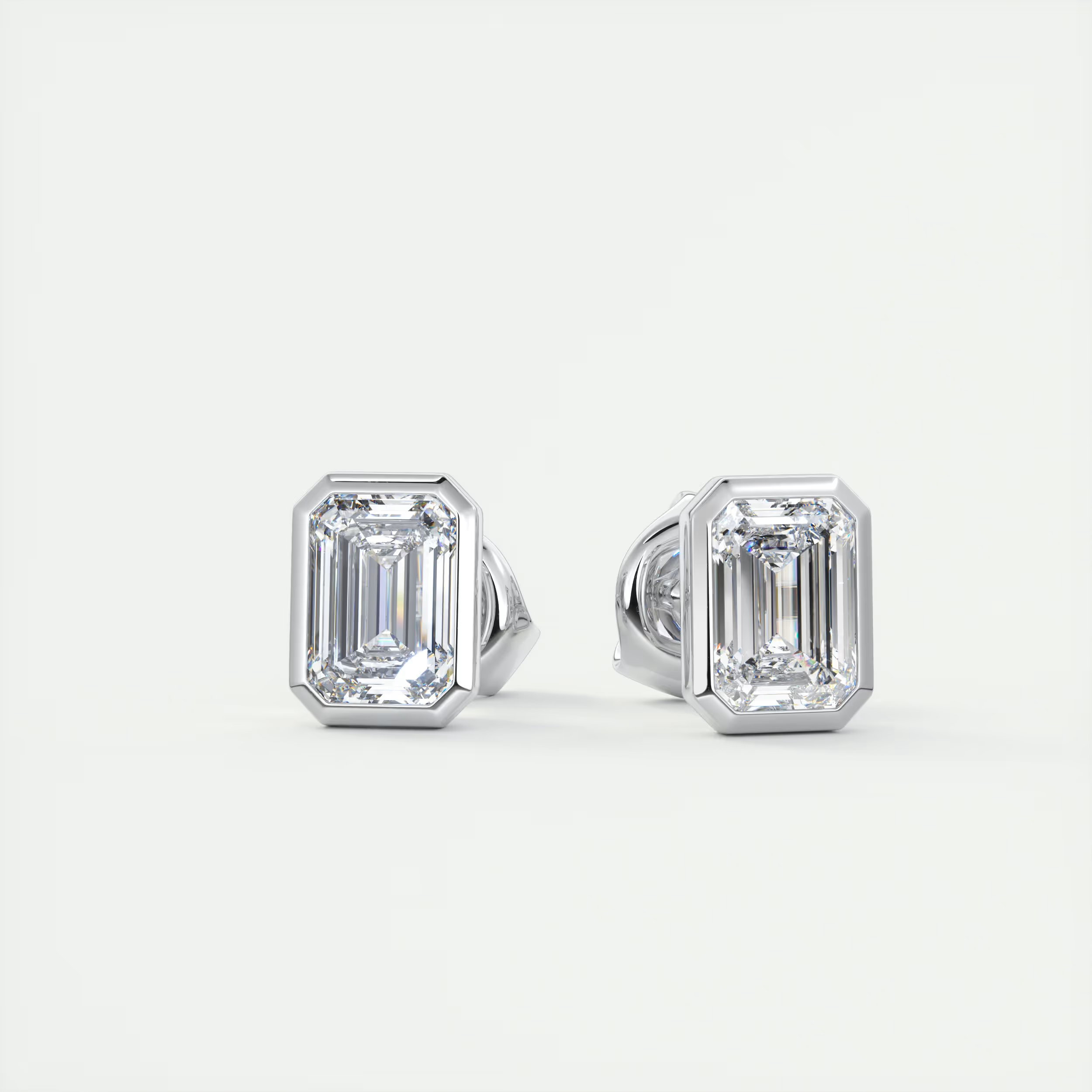 2 ct Emerald Bezel Set Diamond Studs