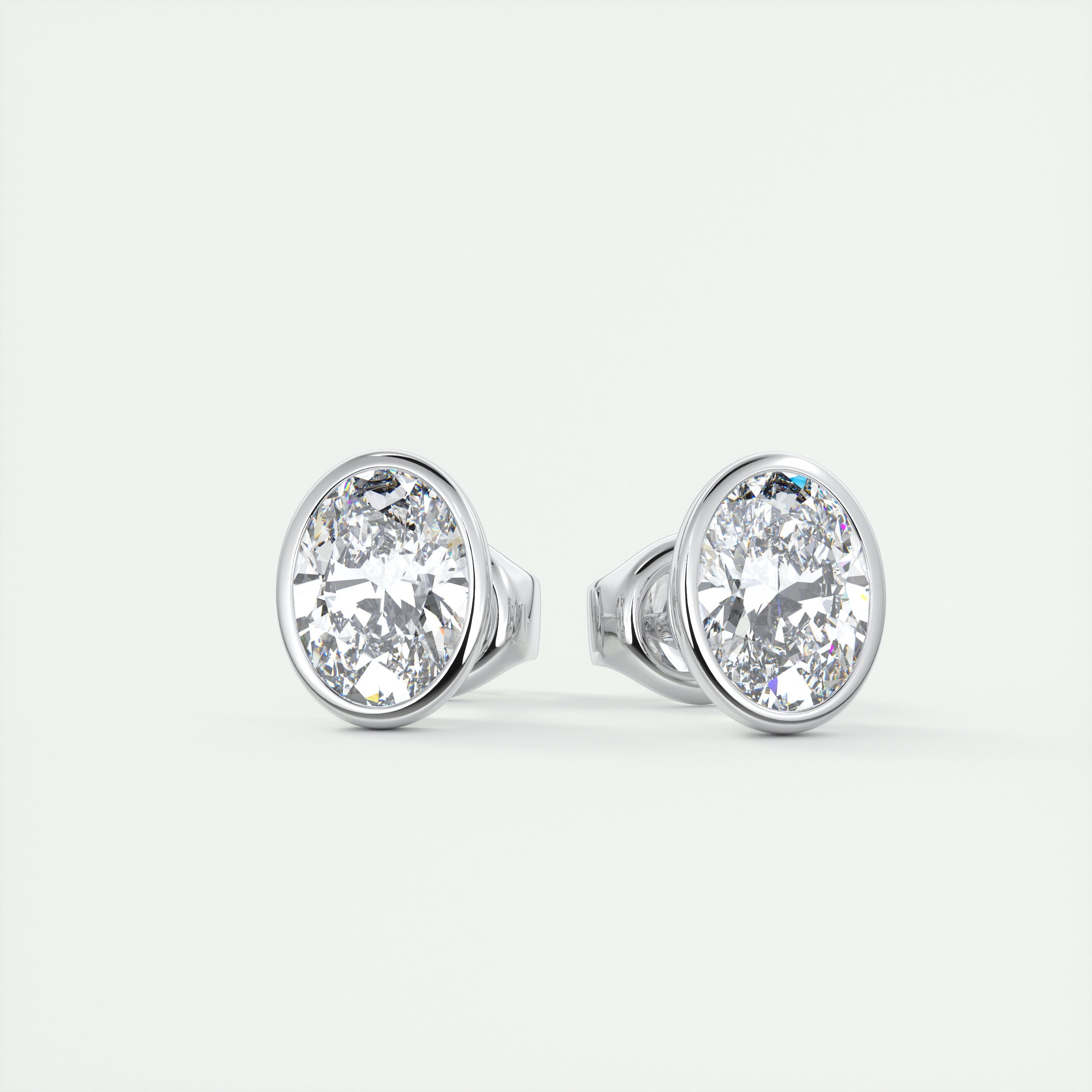 2 ct Oval Bezel Set Diamond Studs