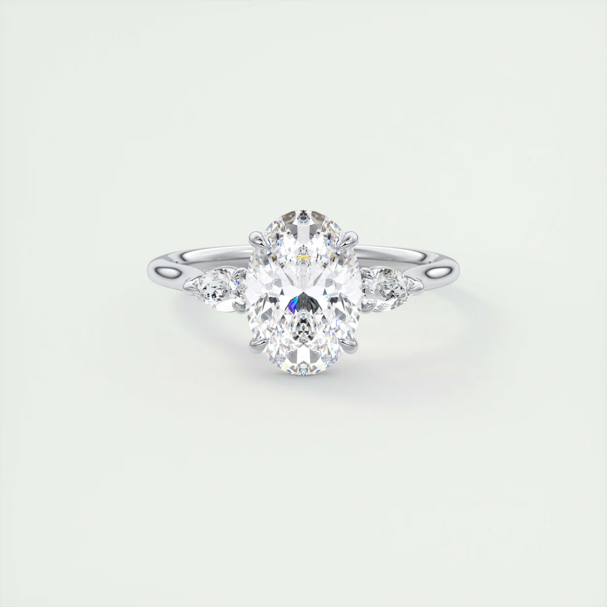 Elegance 2 Carat Oval Center Flush Stacking Pear Three-Stone Engagement Ring