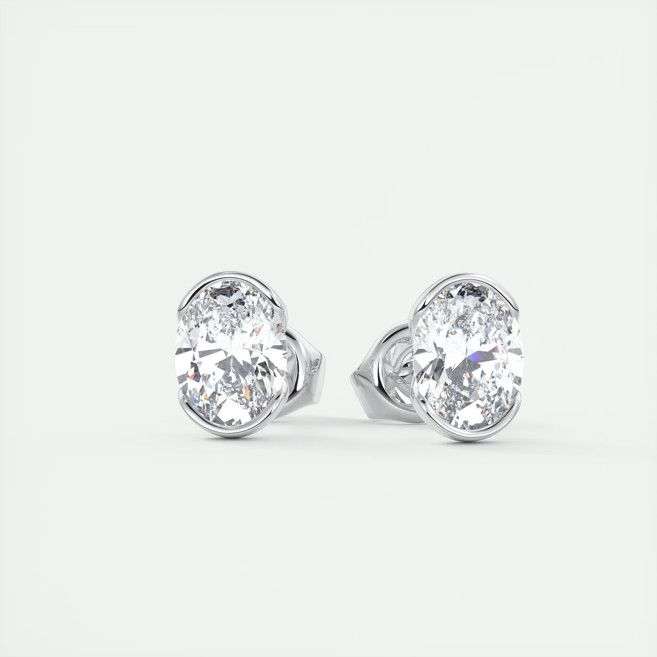2 ct Oval Half Bezel Set Diamond Studs