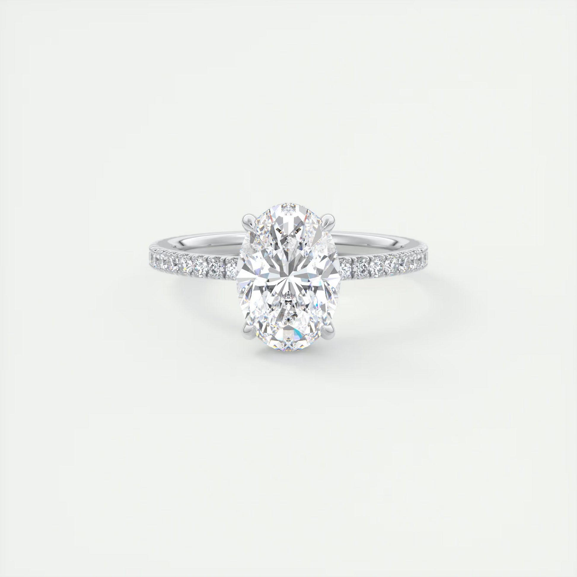 Cncircled 2 Carat Oval Hidden Halo Pavé Setting