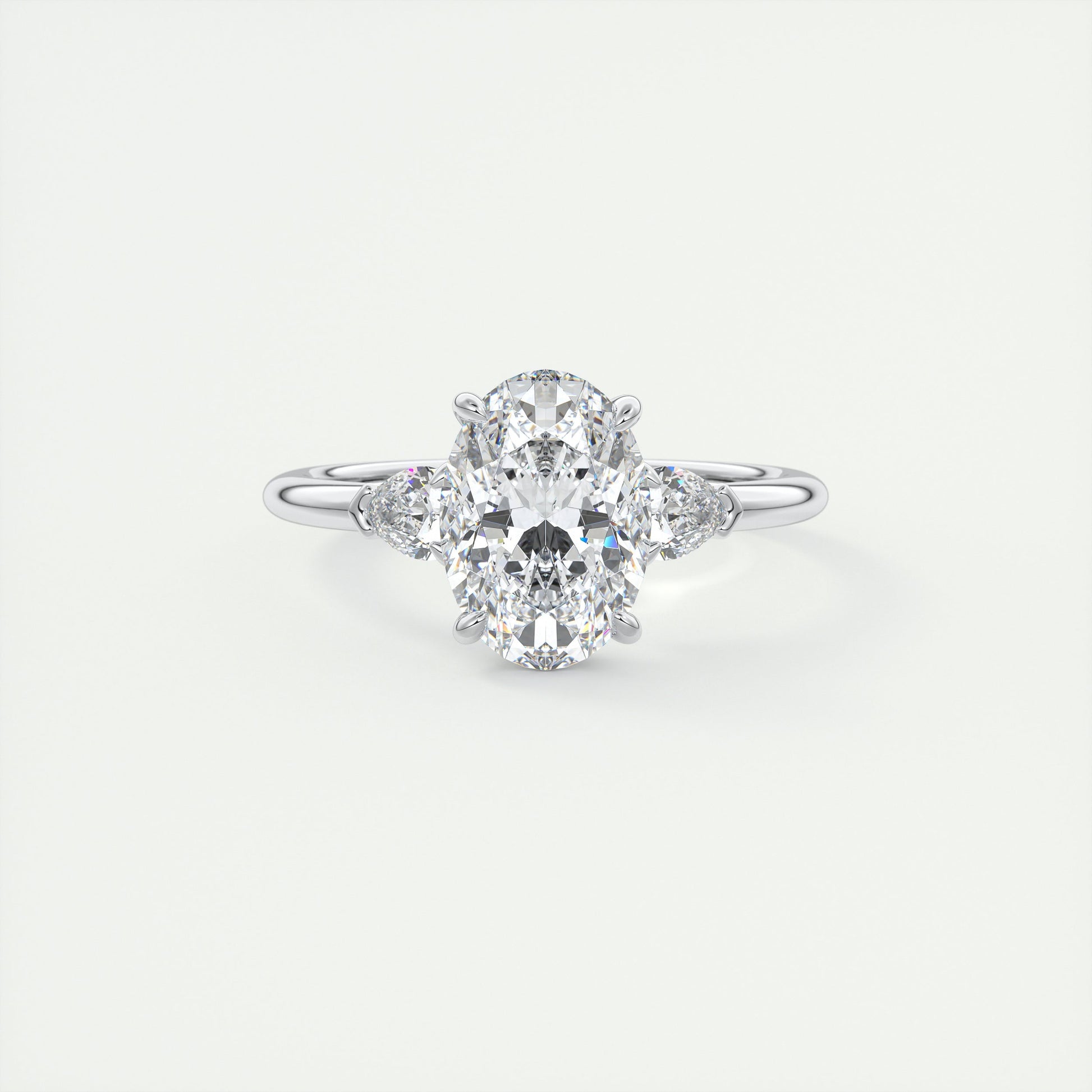 Angle 2 Carat Oval & Pear Plunge Three-Stone Engagement Ring