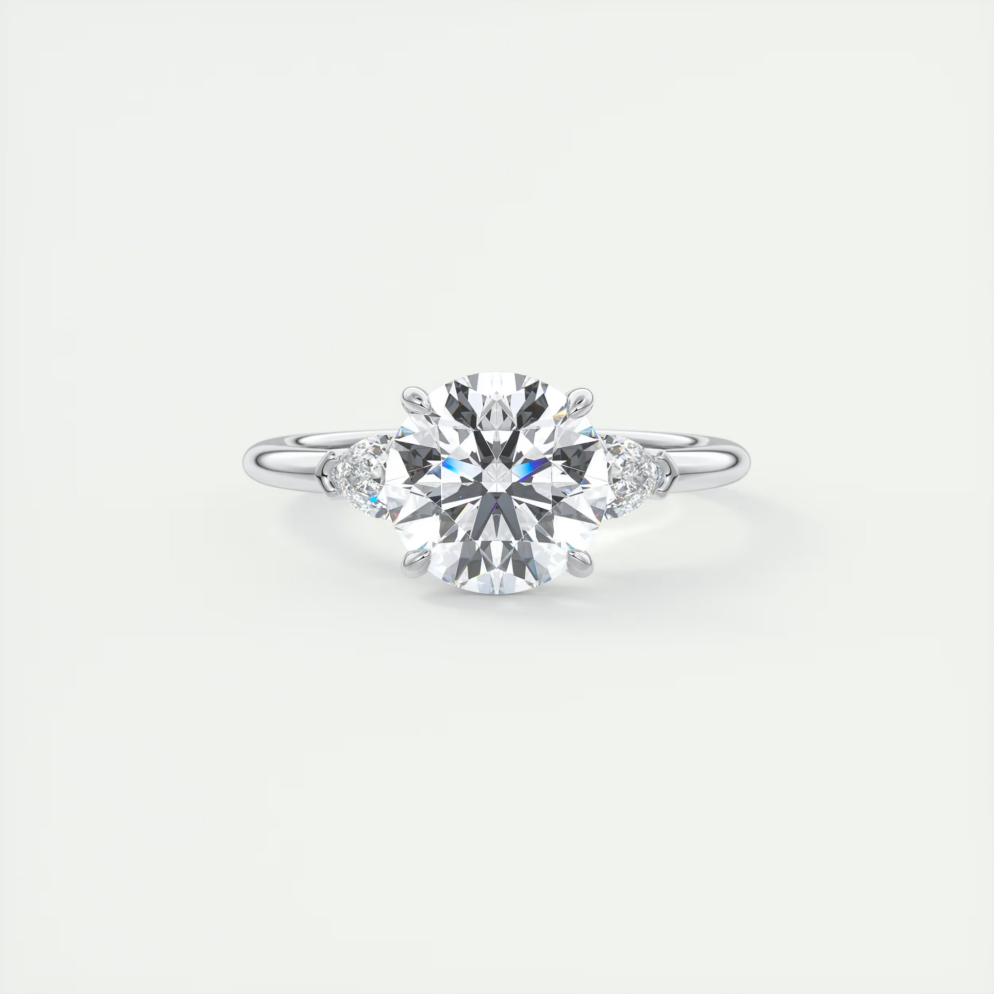 Sculpted 2 Carat Round & Pear Plunge Three-Stone Engagement Ring