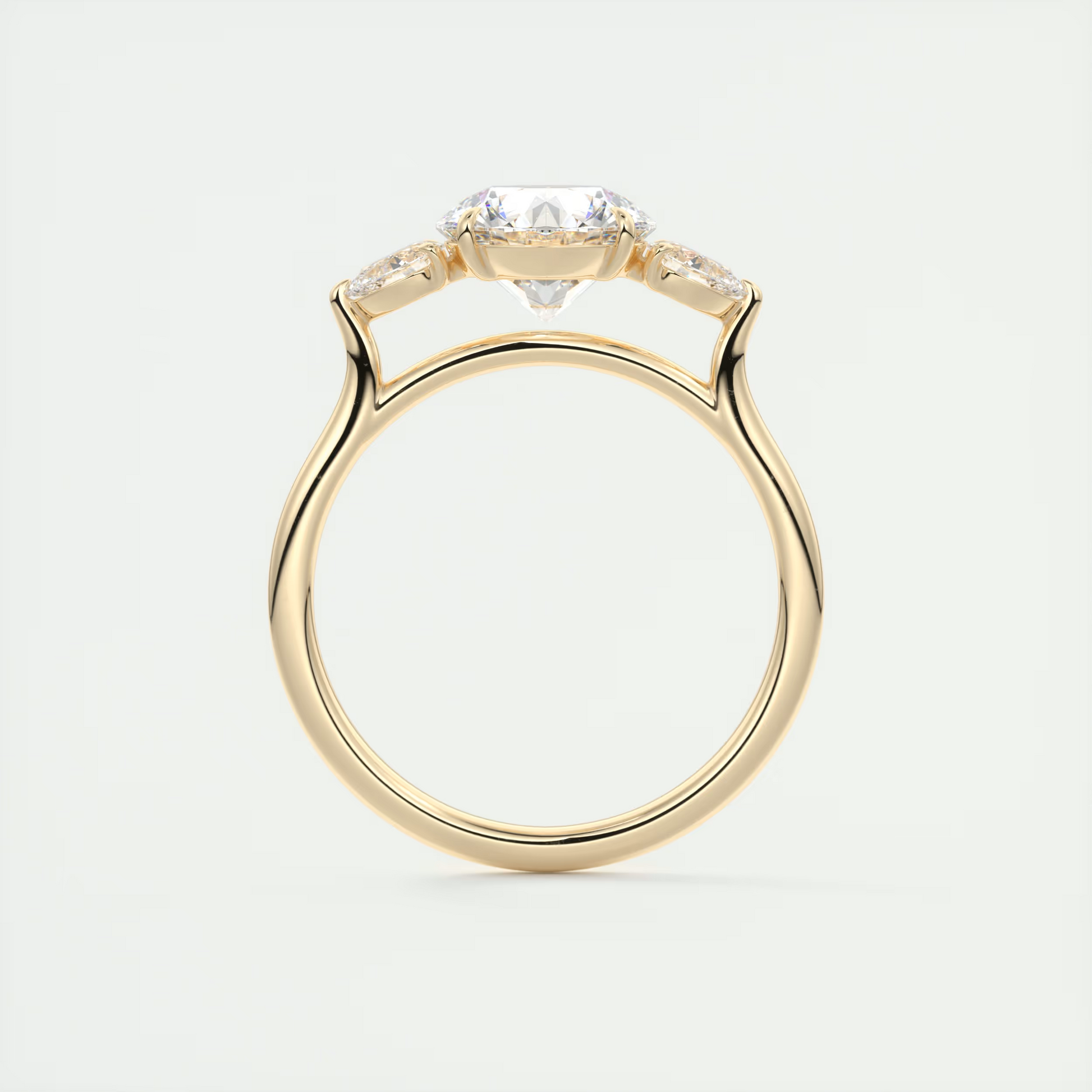 Soft Curves 1.5 Carat Round Flush Stacking Pear Three-Stone Engagement Ring