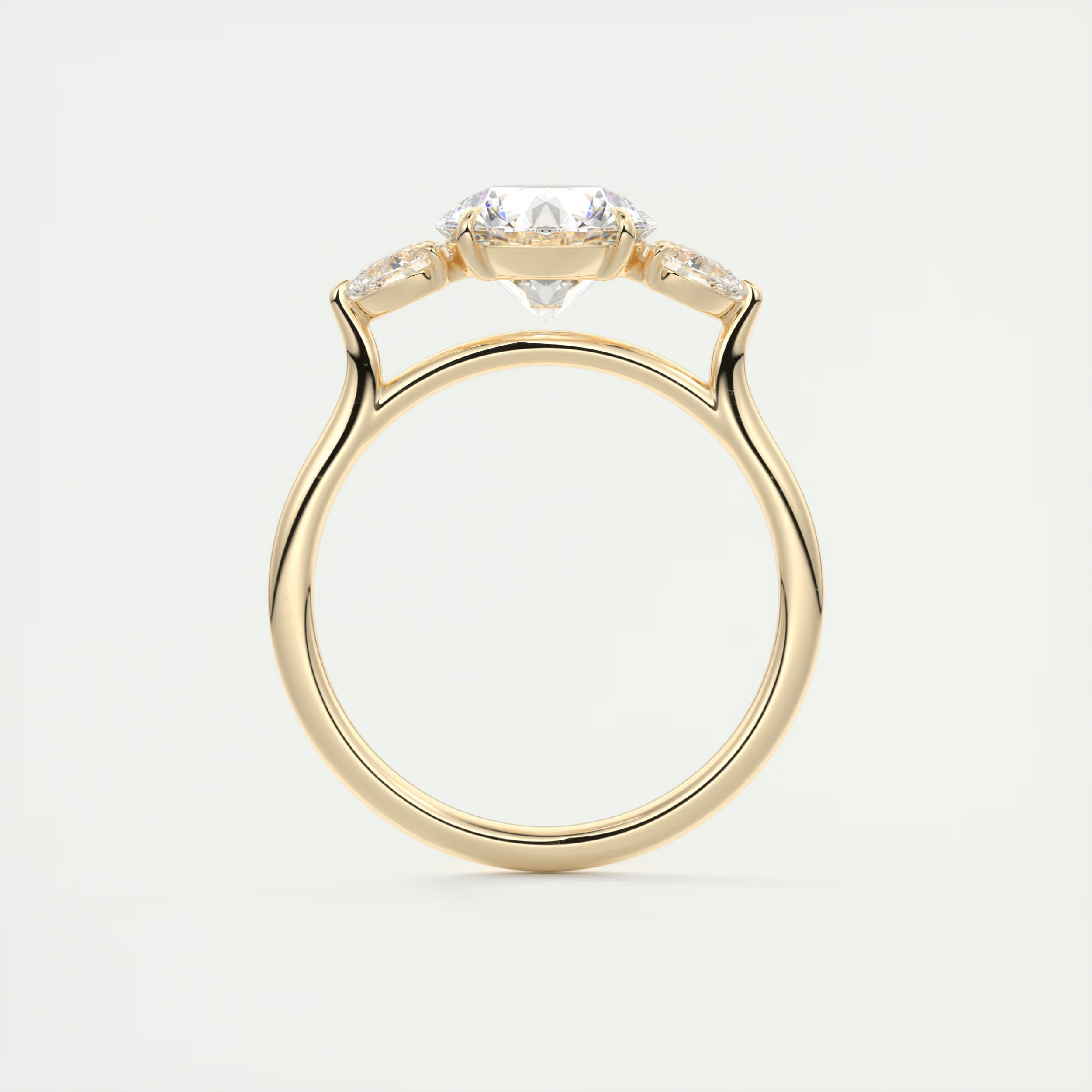Soft Curves 1.5 Carat Round Flush Stacking Pear Three-Stone Engagement Ring