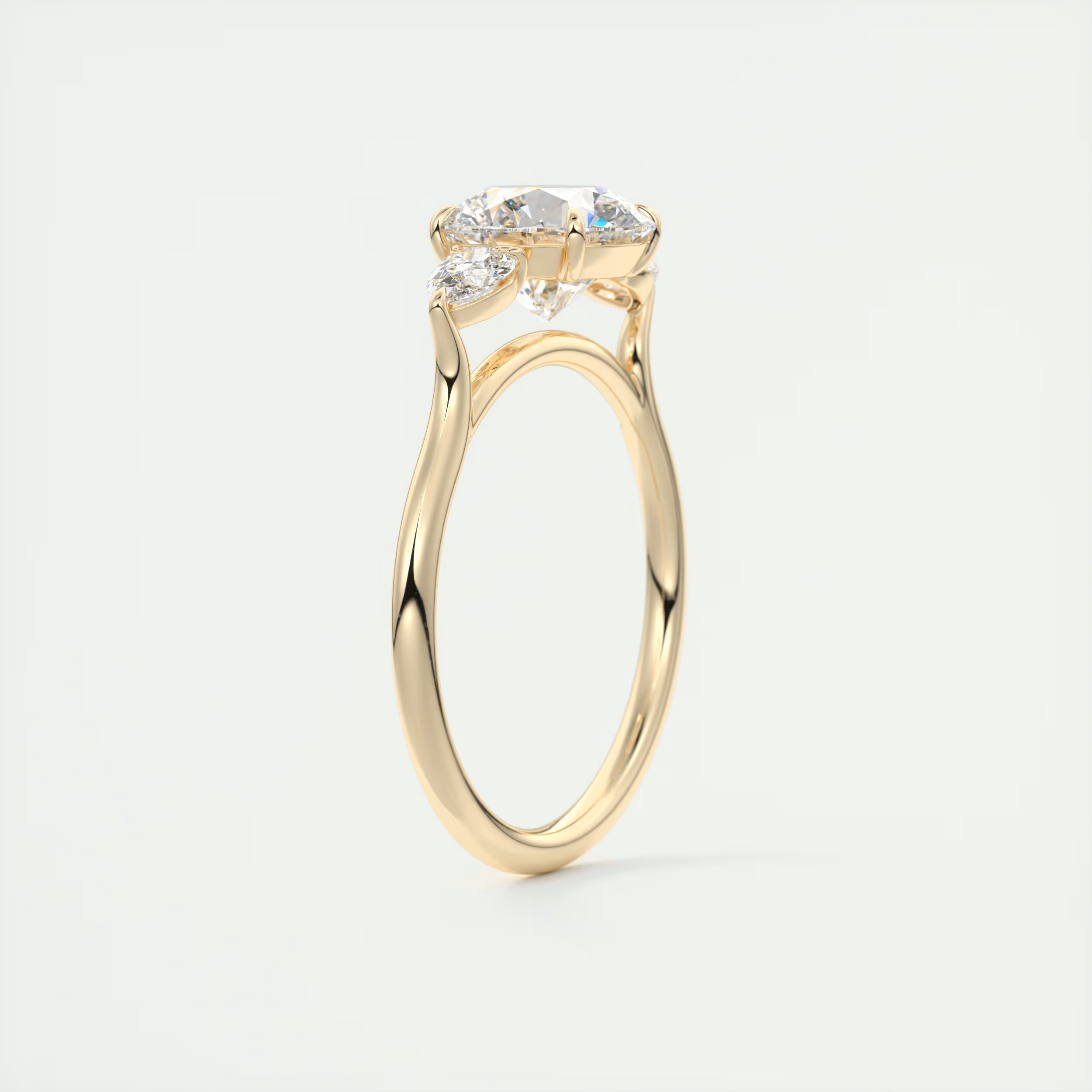 Soft Curves 1.5 Carat Round Flush Stacking Pear Three-Stone Engagement Ring