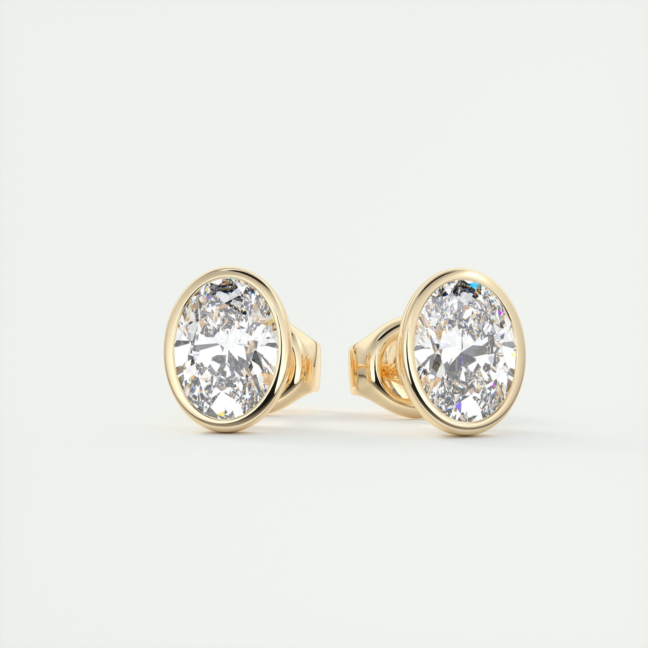 2 ct Oval Bezel Set Diamond Studs