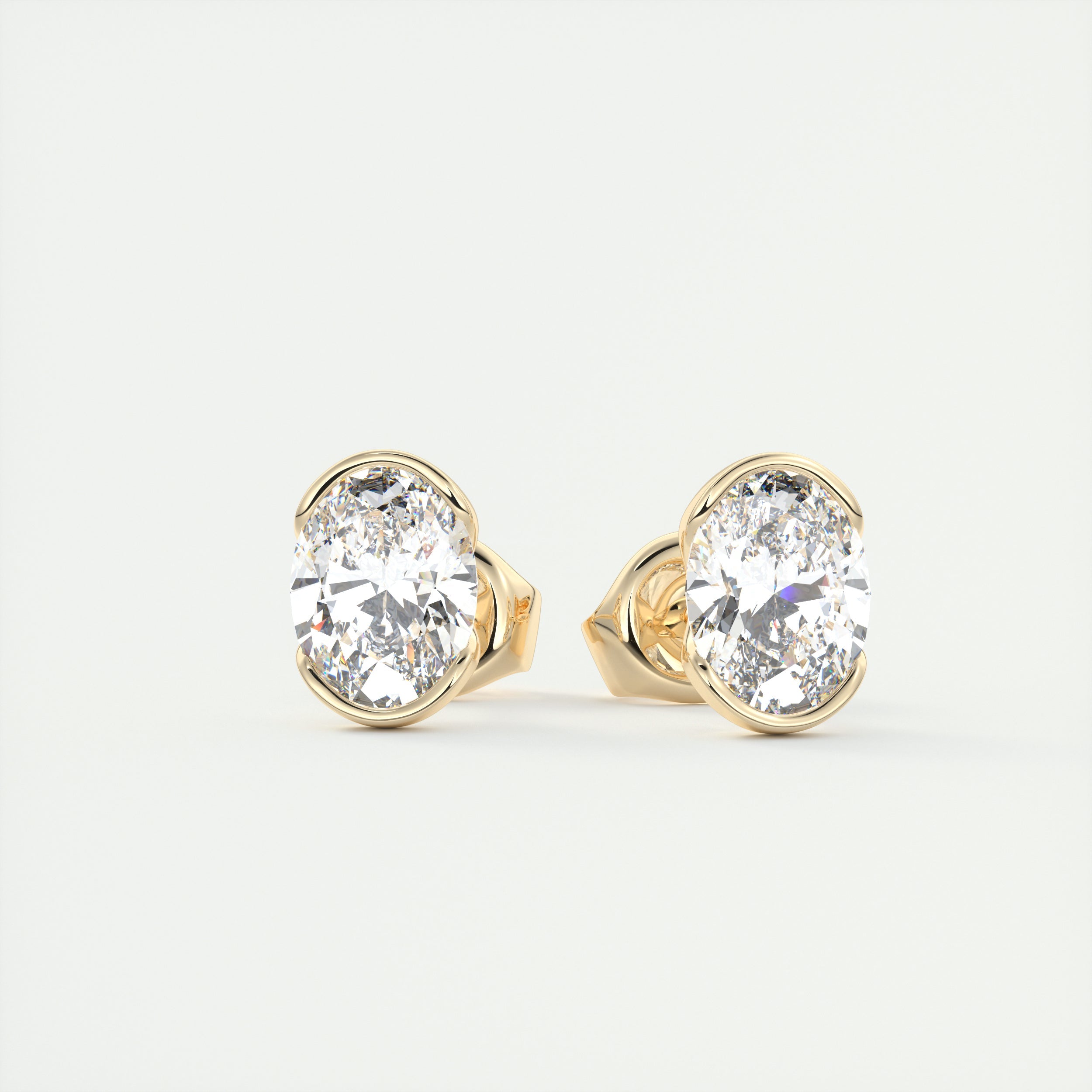 2 ct Oval Half Bezel Set Diamond Studs