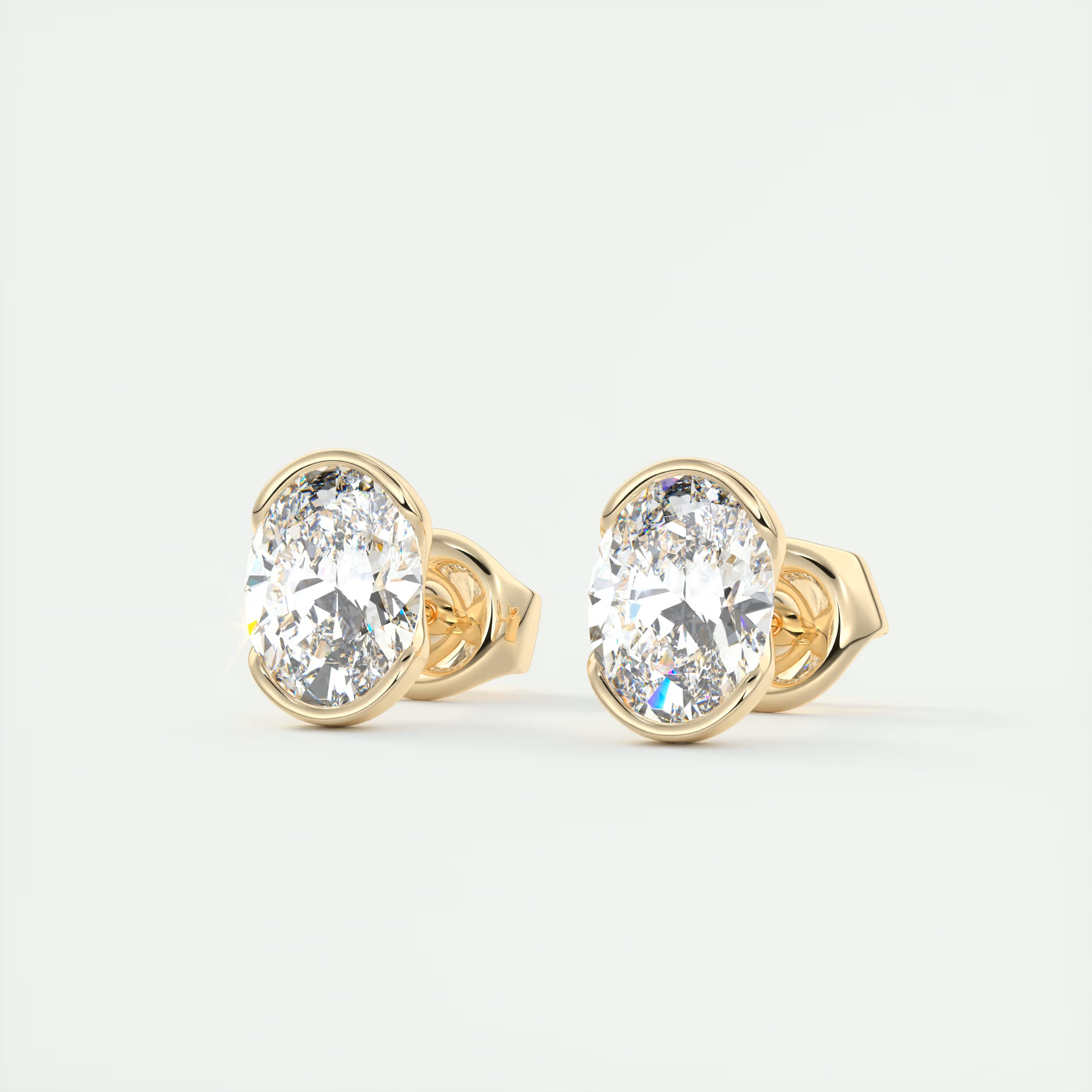 2 ct Oval Half Bezel Set Diamond Studs