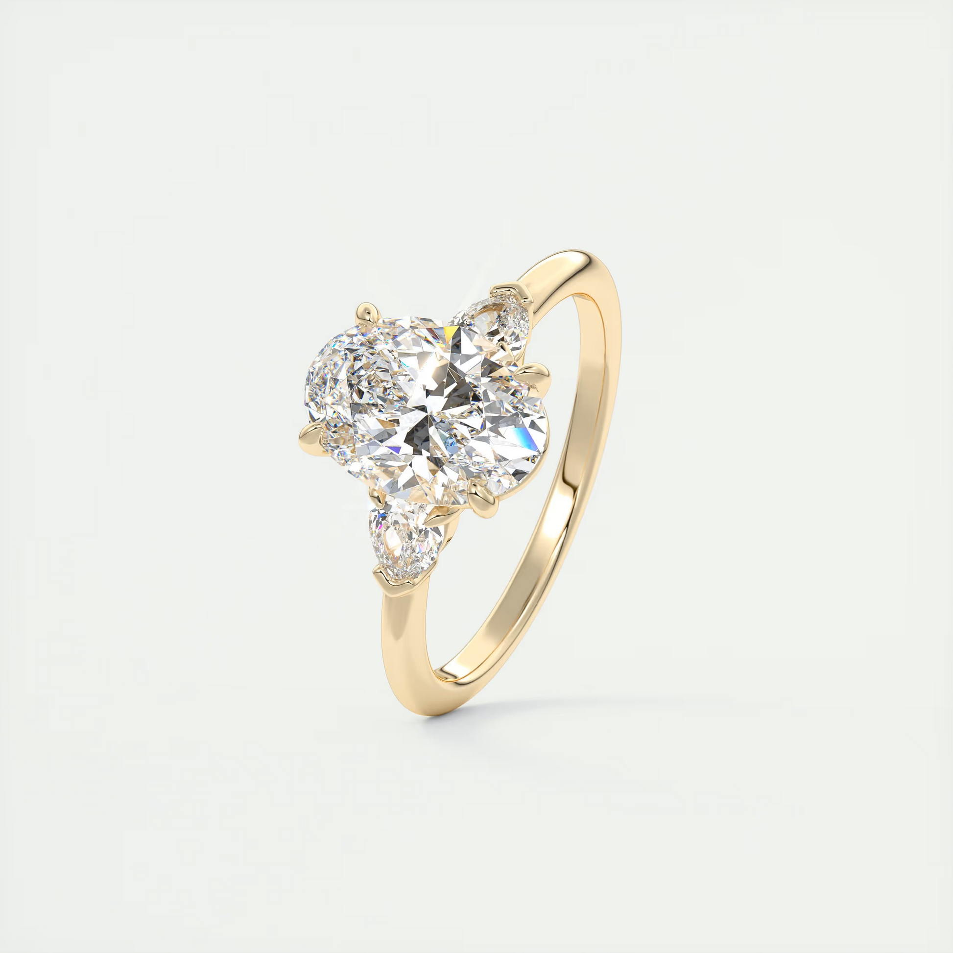 Angle 2 Carat Oval & Pear Plunge Three-Stone Engagement Ring
