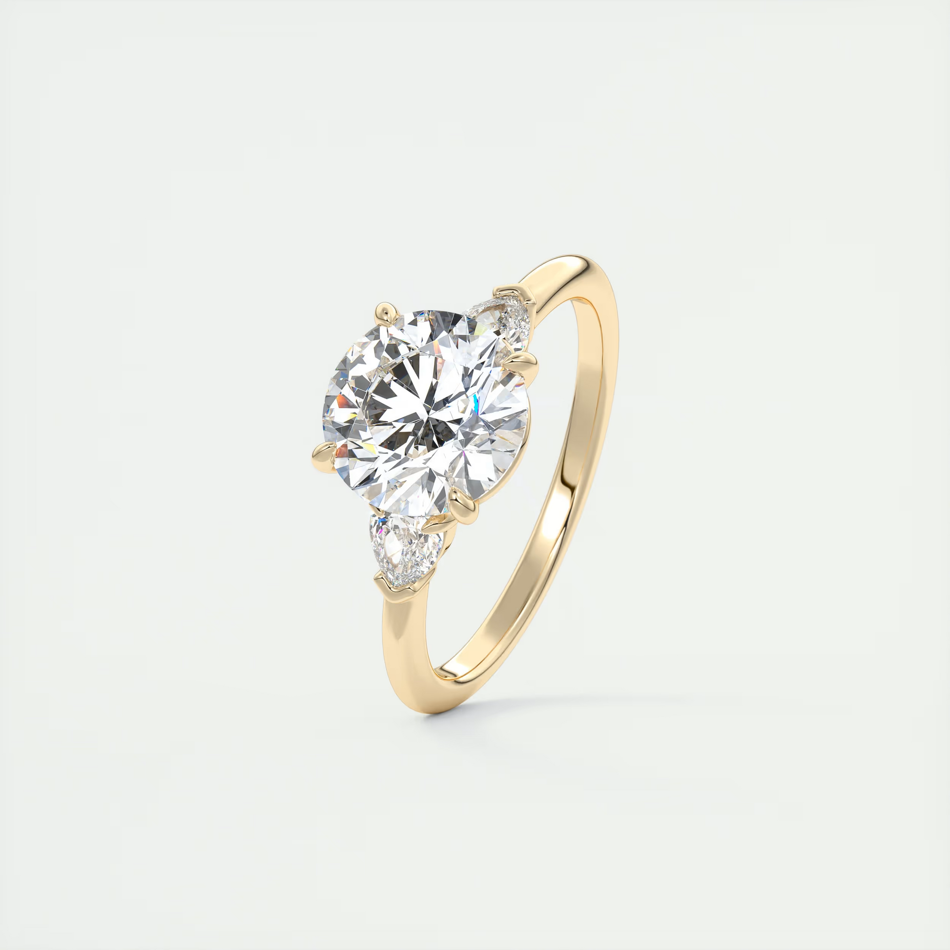 Sculpted 2 Carat Round & Pear Plunge Three-Stone Engagement Ring