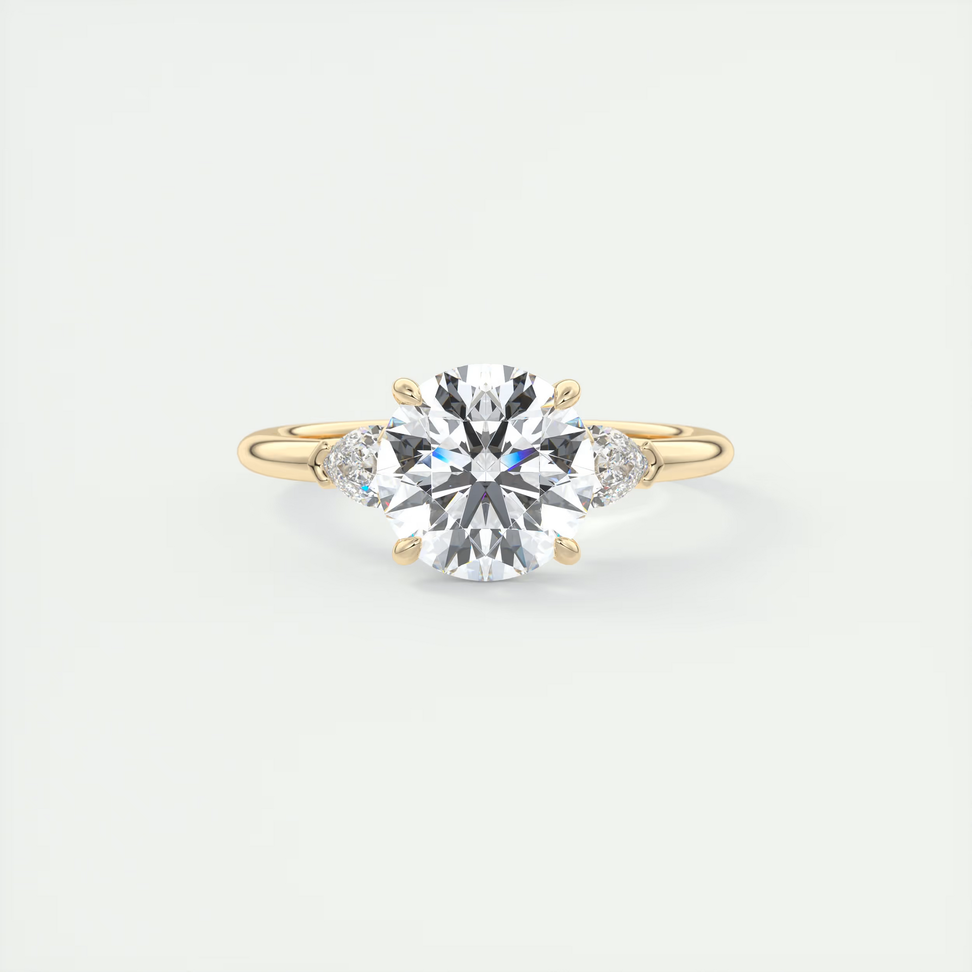 Sculpted 2 Carat Round & Pear Plunge Three-Stone Engagement Ring