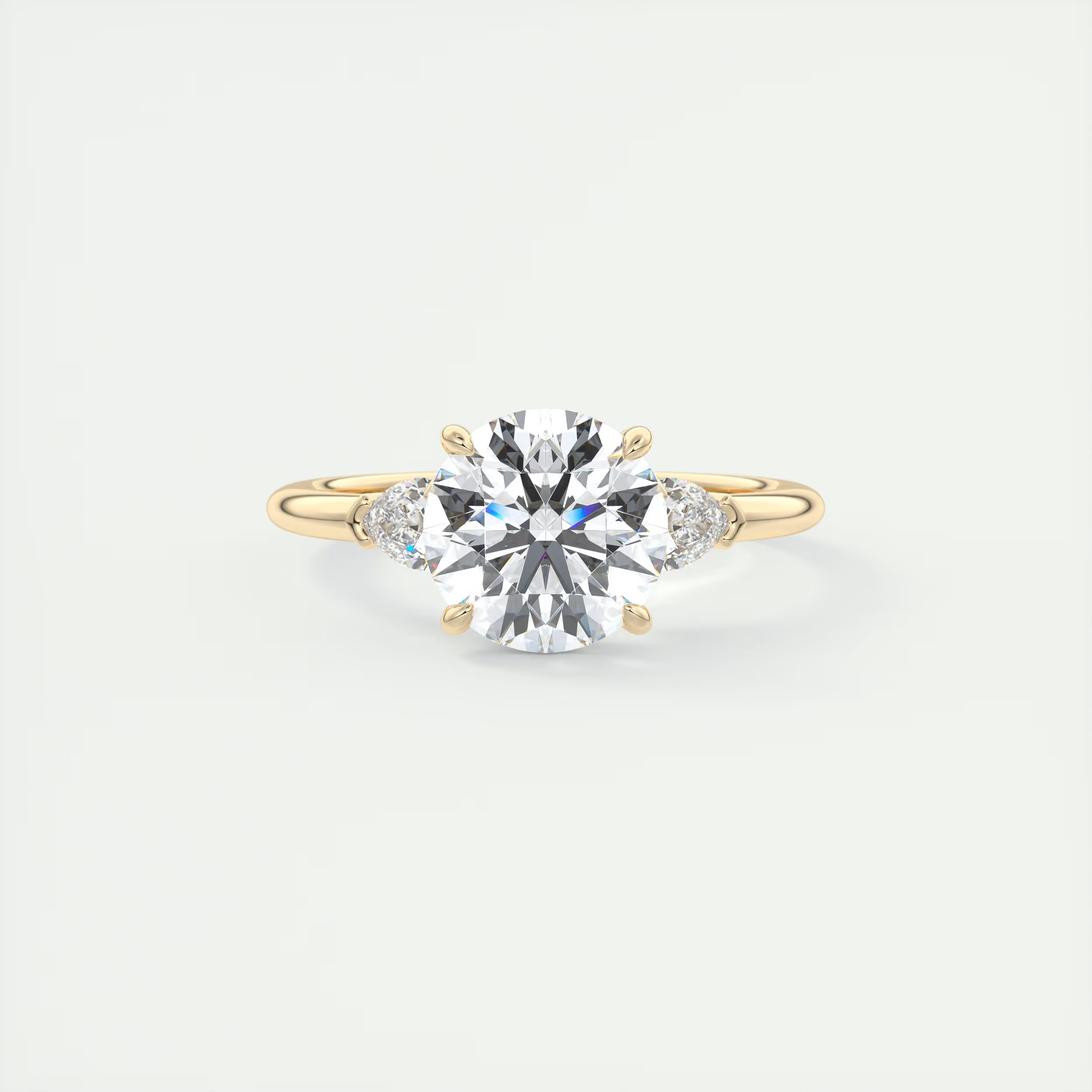 Sculpted 2 Carat Round & Pear Plunge Three-Stone Engagement Ring