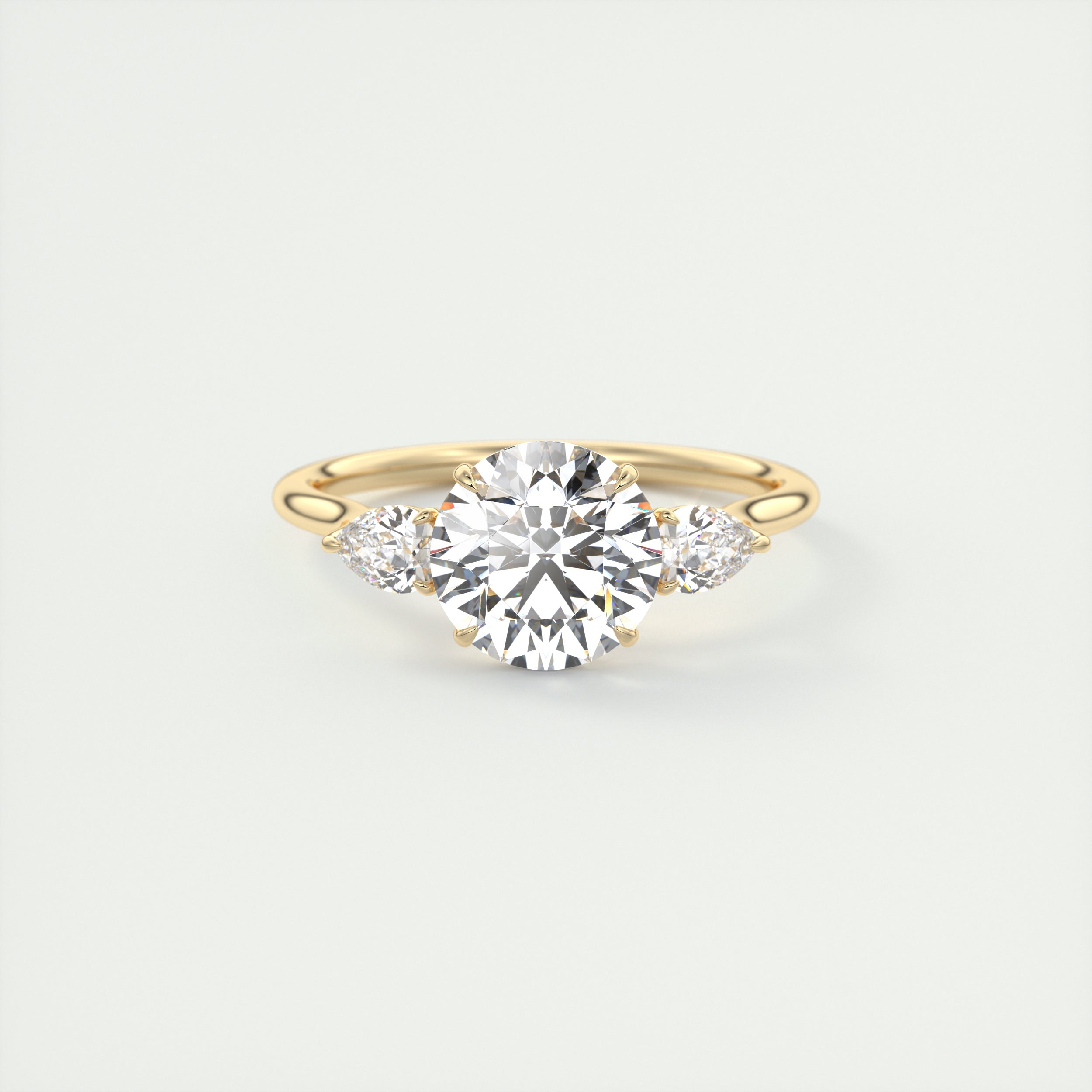 Soft Curves 1.5 Carat Round Flush Stacking Pear Three-Stone Engagement Ring